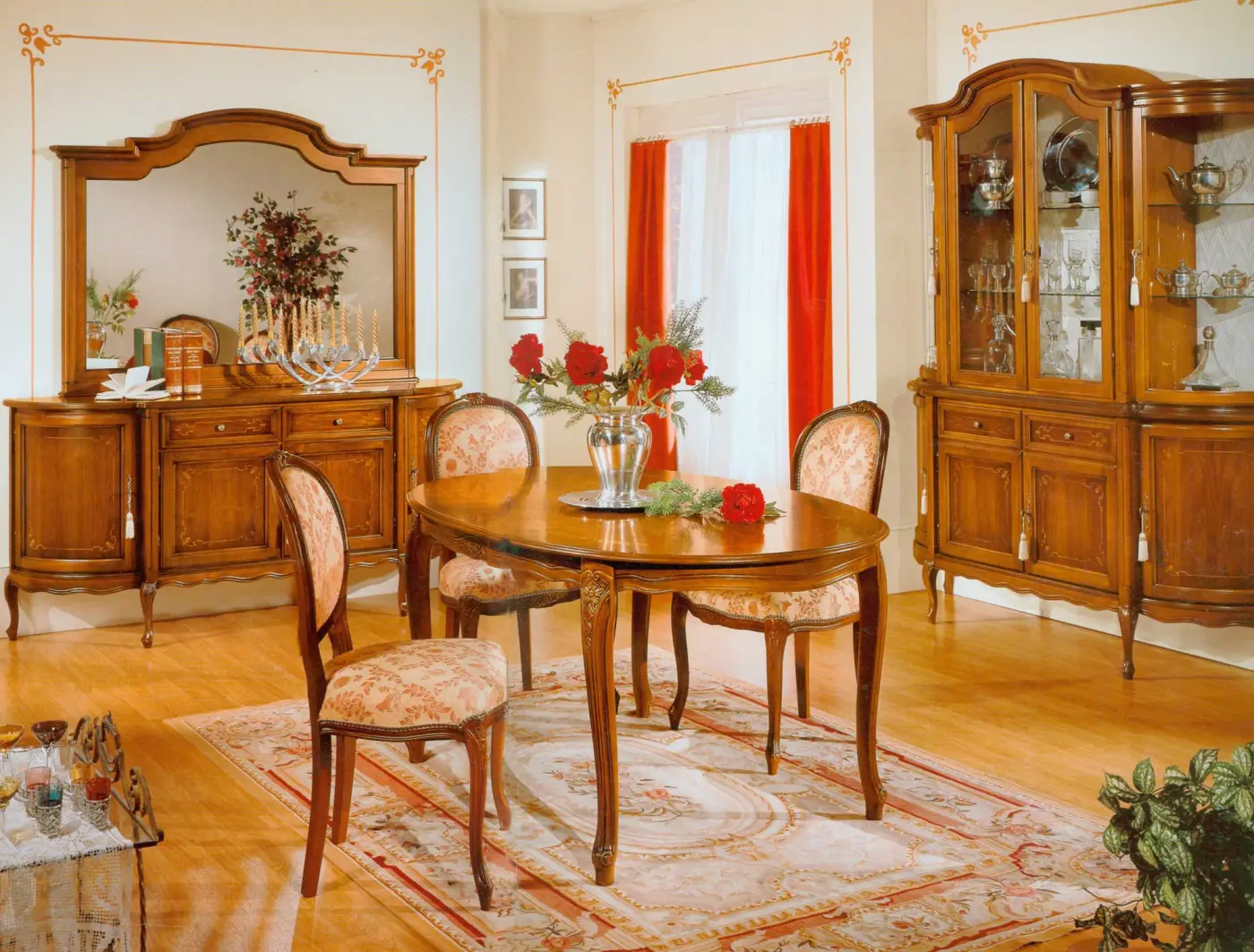 A living room furnished with DEKOR period furniture — display cabinet, sideboard and suite.